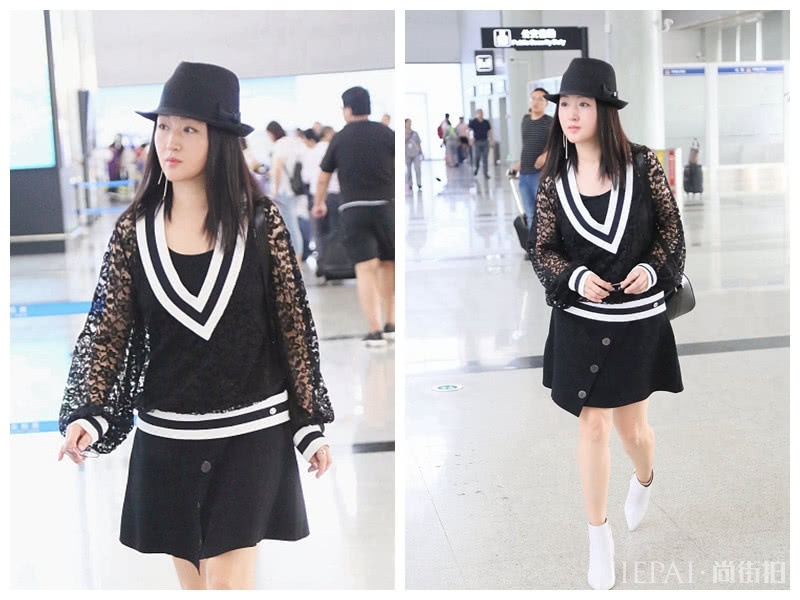 杨钰莹现身机场,蕾丝V领上衣配短裙,40多岁了越活越年轻