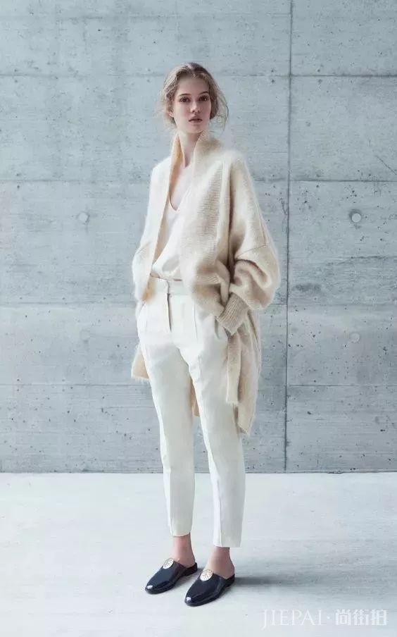 针织衫是秋冬季的标配,但这样搭会更加时髦有气质哟