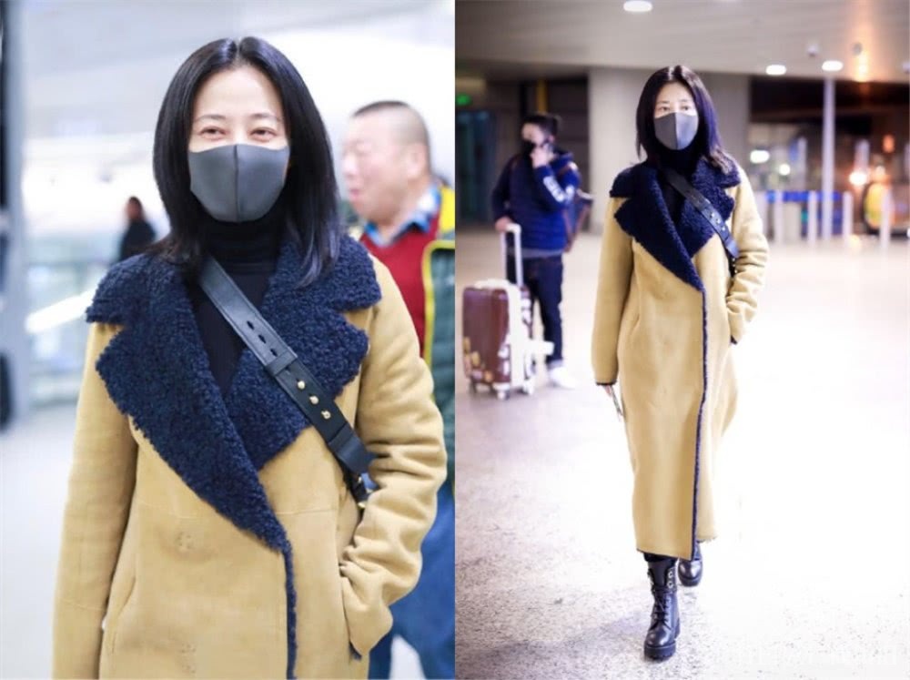 “高贵妃”谭卓机场街拍,虽然旧衣新穿,但戴上墨镜依然很酷