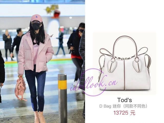 韩雪穿粉色羽绒服现身机场，超可爱