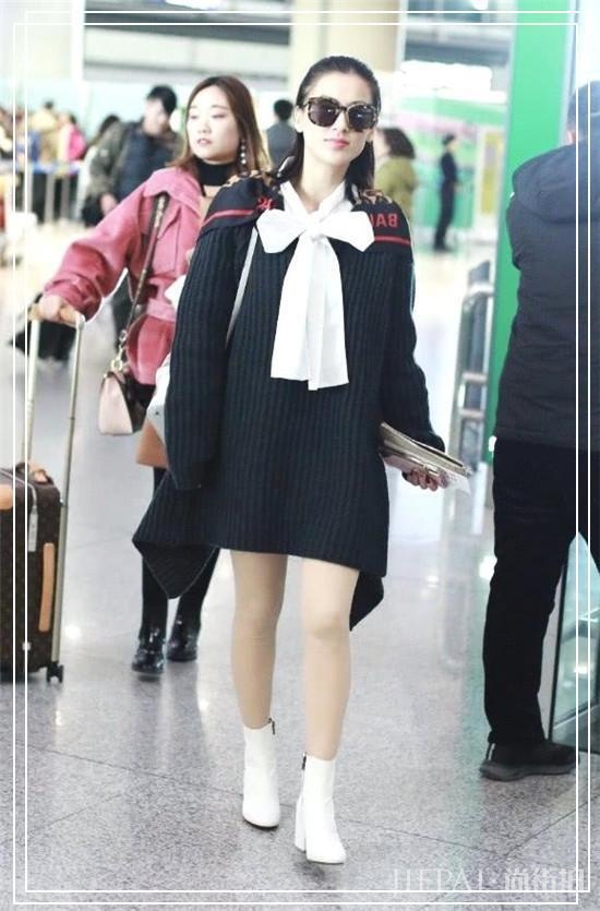 机场保暖只服黄圣依，雷锋帽配大棉袄+“狗熊鞋”