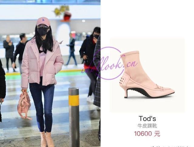 韩雪穿粉色羽绒服现身机场，超可爱