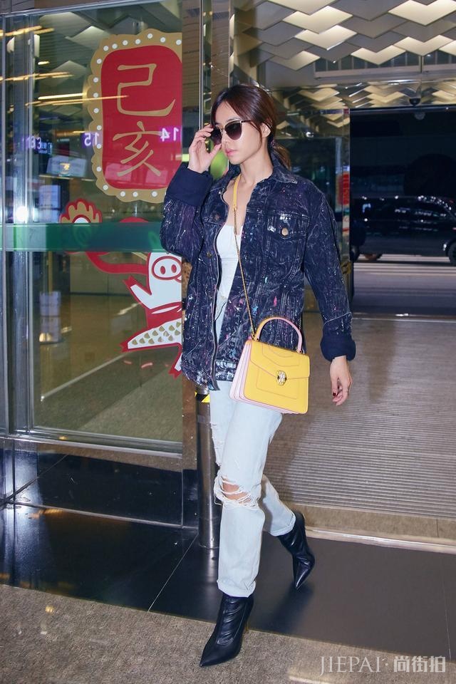 蔡依林深夜机场时尚掀起骚动！