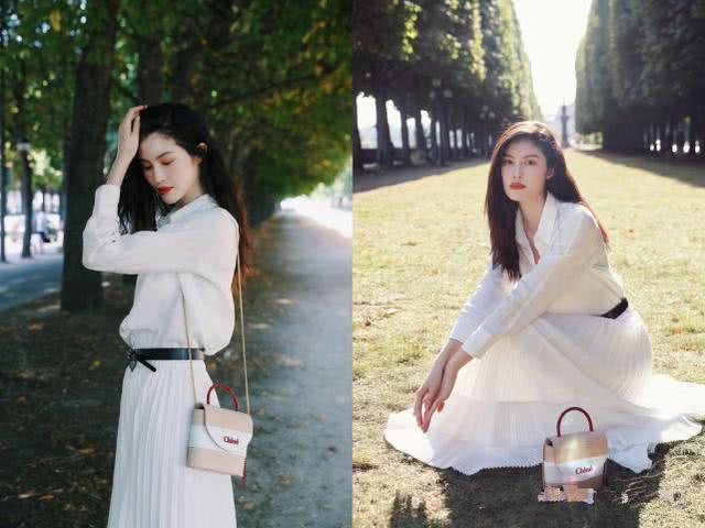 何穗穿一袭白色衬衫裙,清新干净优雅大气,让人看着心里都舒适