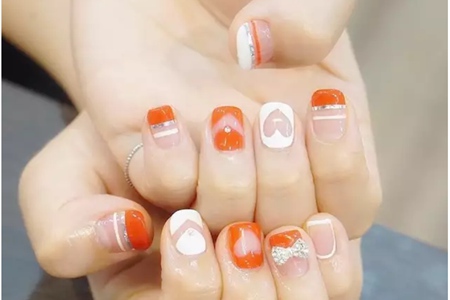 1563955466855323.jpg 南瓜色美甲成为最新时尚,显白款式图片大集合
