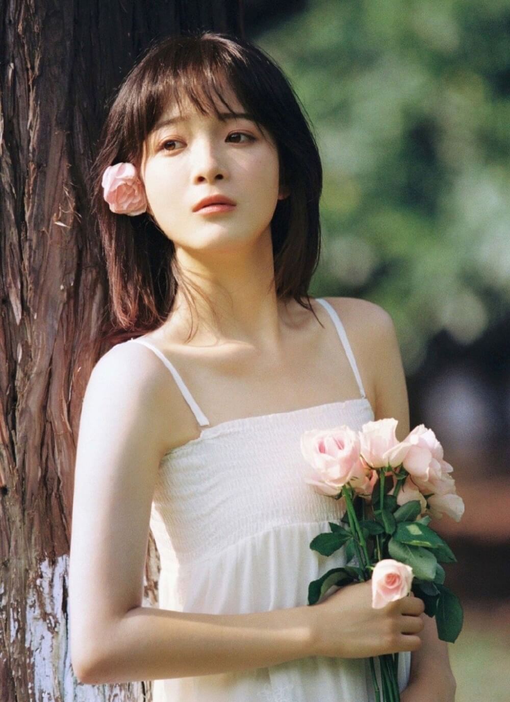 头戴花朵可爱短脸软妹日杂风胶卷图片写真