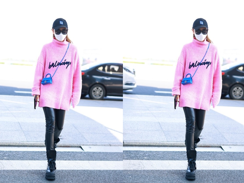 戚薇机场街拍:短发加上彩虹针织衫玩下身失踪,大长腿太性感