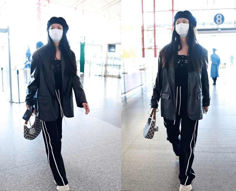 林允机场街拍：穿灰色卫衣搭配工装马甲休闲又有范