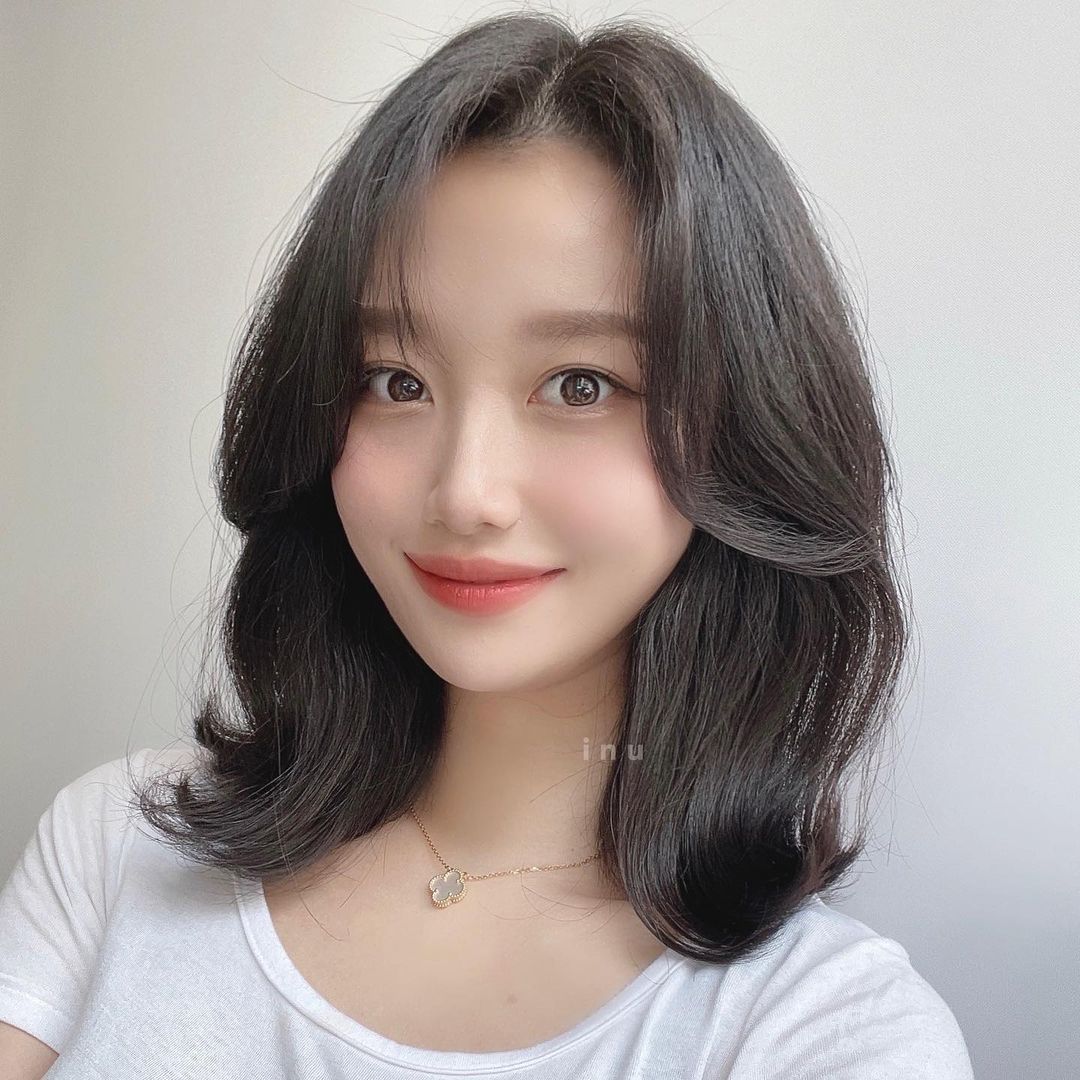 像刚睡醒时的慵懒随性,这才是长发烫卷的不二之选