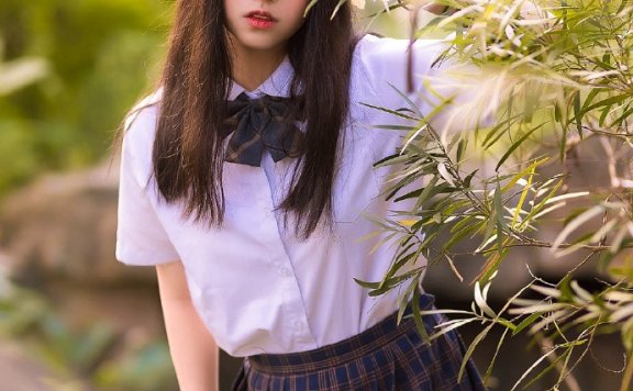 甜美JK制服美女白皙美腿写真图片