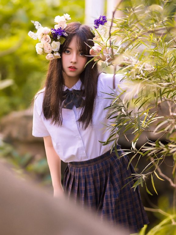 甜美JK制服美女白皙美腿写真图片